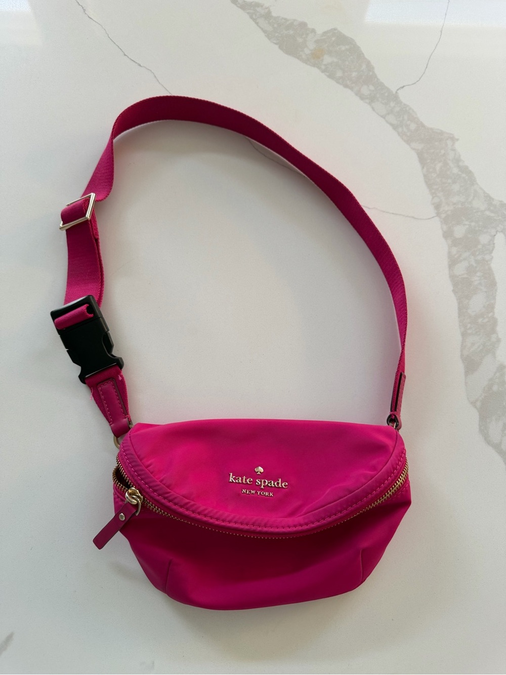 Kate Spade Dorien nylon fanny pack belt bag in a bright magenta